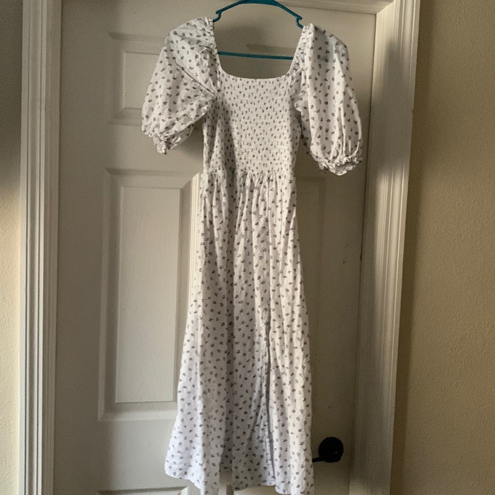 White floral dress. Worn when I was a size 4 and it fit very well. MEDIUM